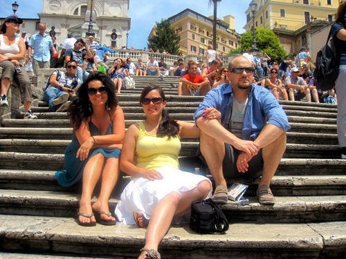 Joyce taking a break from exploring by sitting on the Spanish Steps in Rome