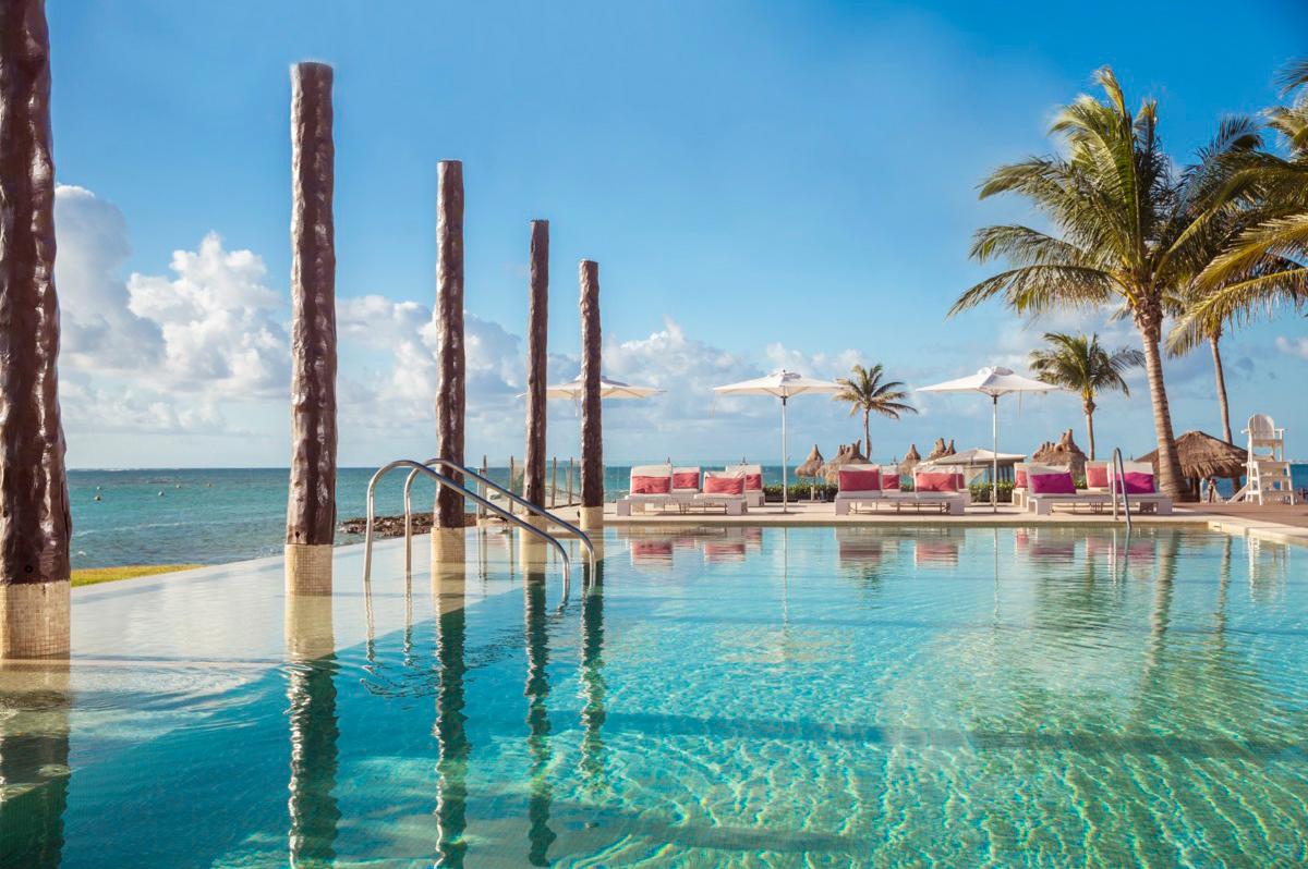 Beautiful sunbathing infinity pool at Club Med All-Inclusive resort