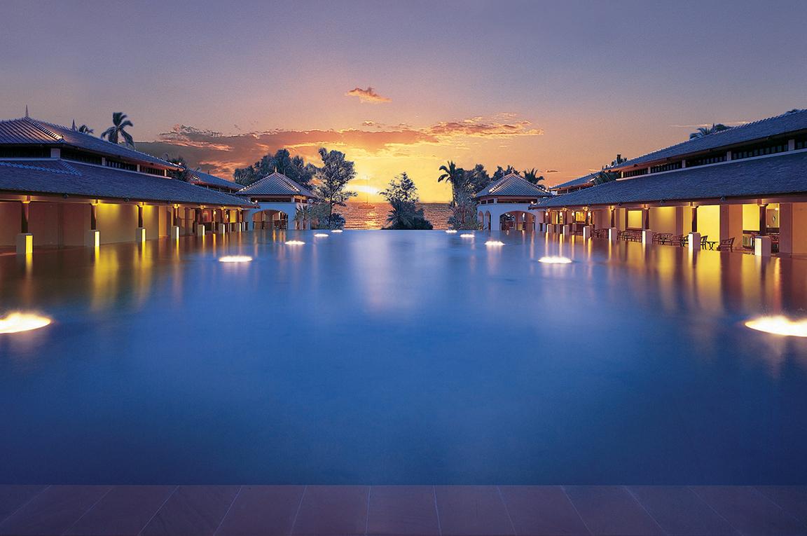 View the sunrise from luxury infinity pools like at the JW Marriott Phuket Resort & Spa