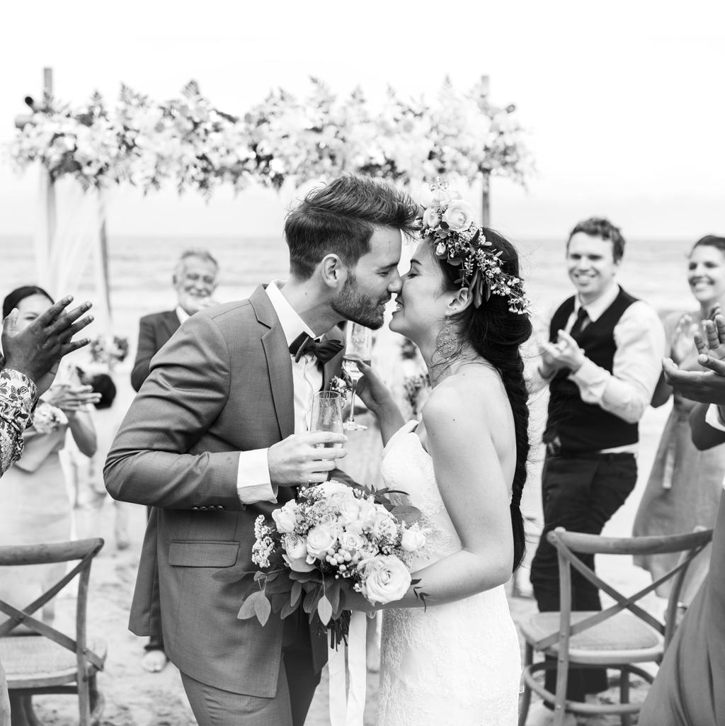 couple about to kiss after having exchanged wedding vows at their destination wedding