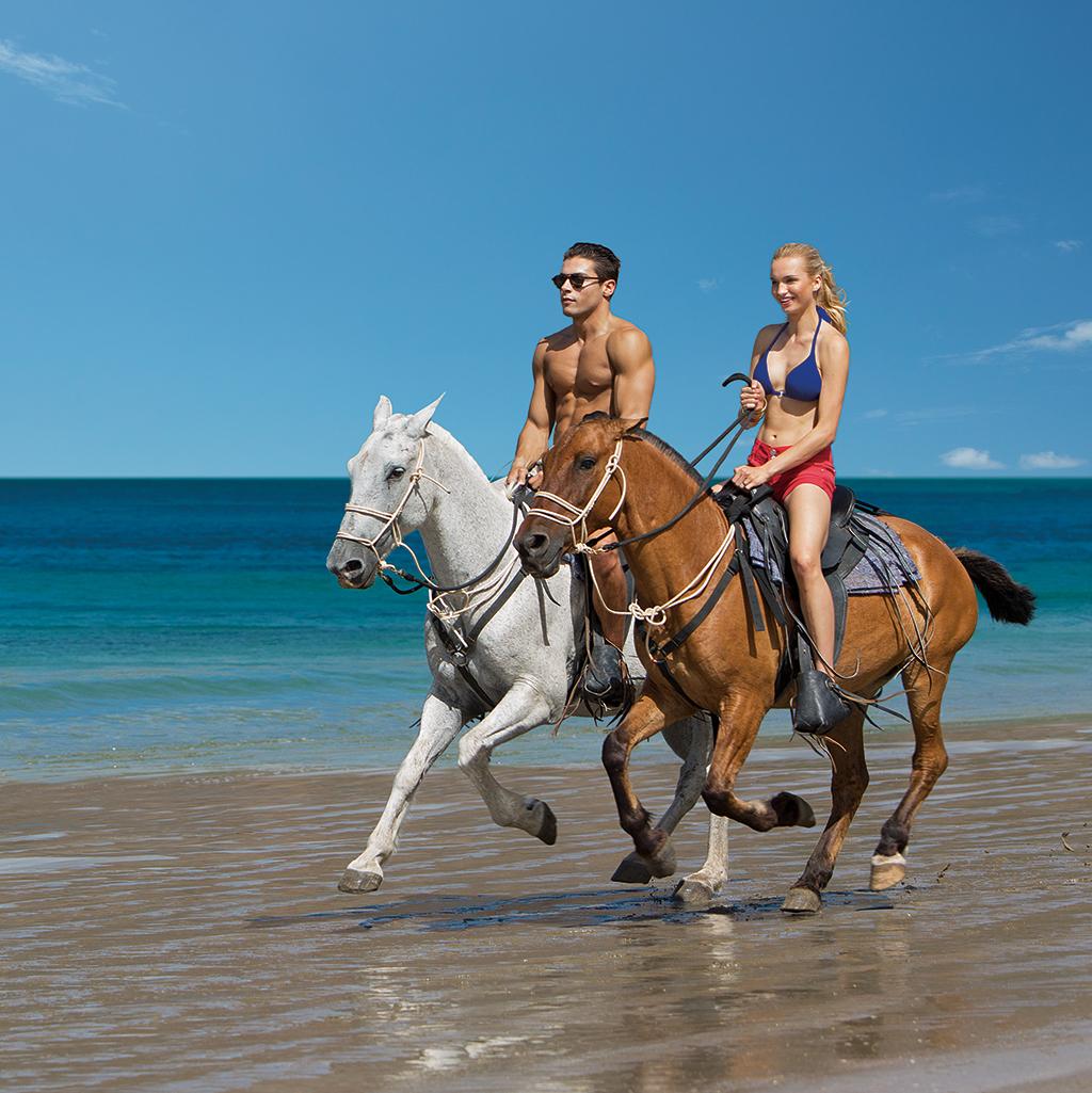 Horseback riding on the beach in La Romana