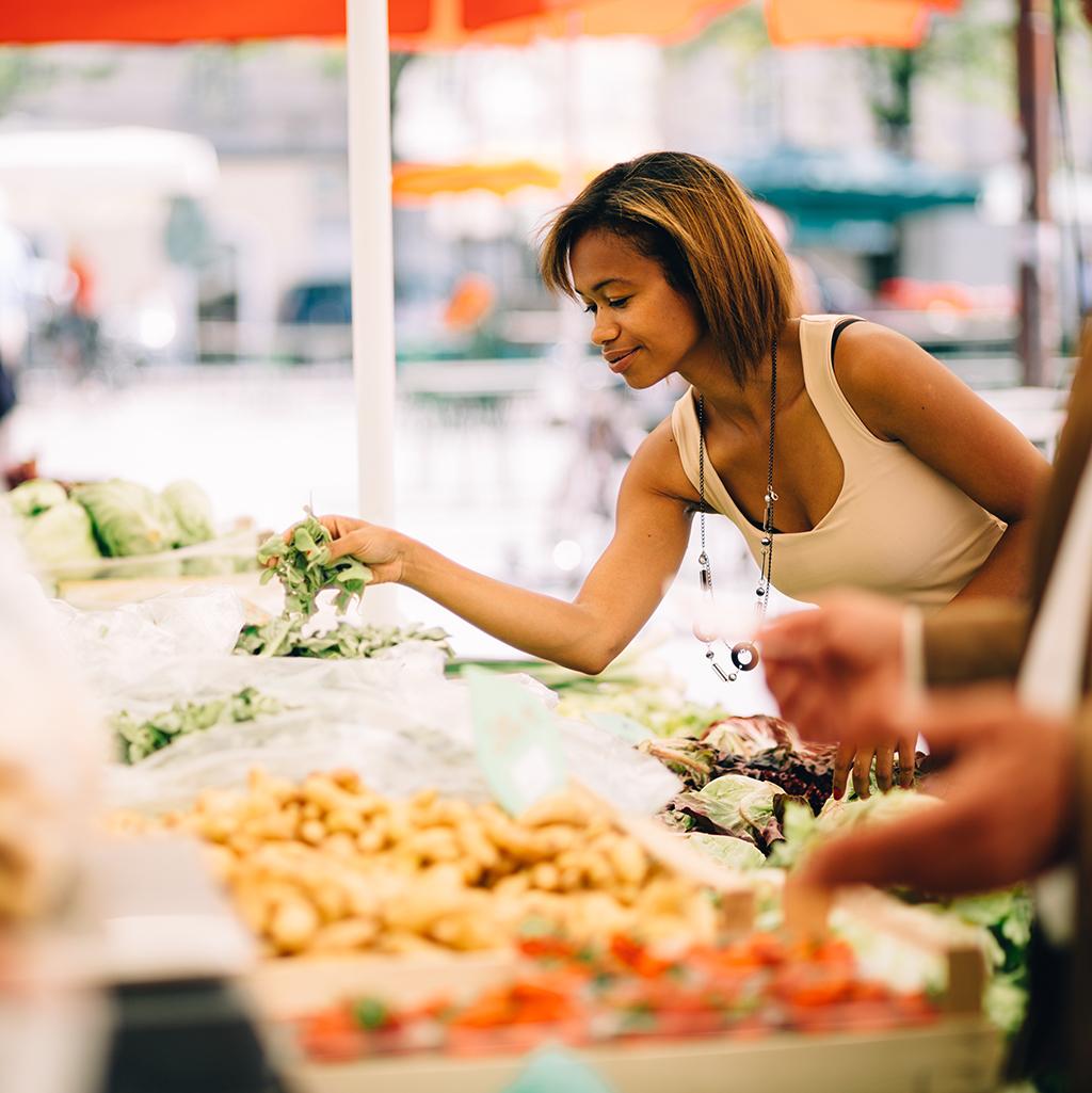 Girl shopping at local market in Montreal