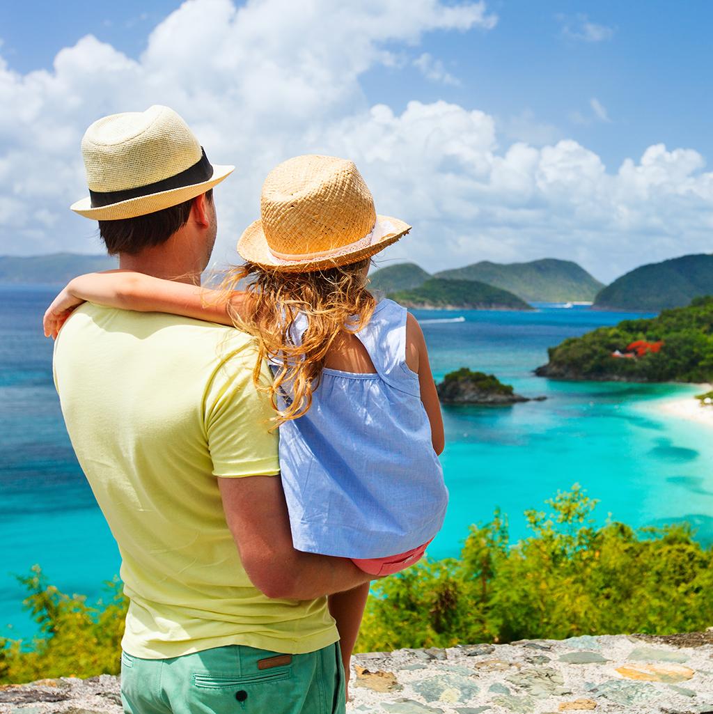 Father and child overlooking St. John’s coastline