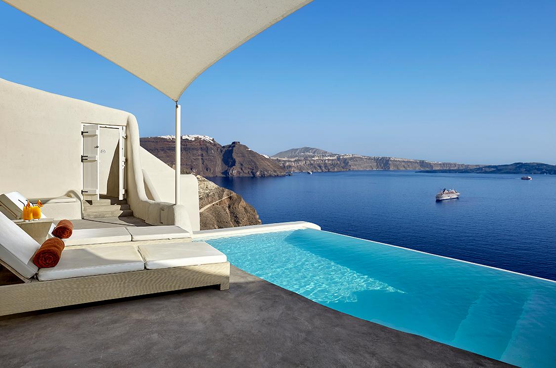 Sit by the pool in accommodations with stunning views at the Luxury Collection