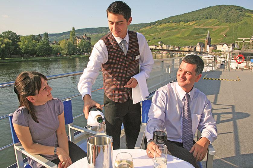 Sip some wine aboard an Avalon Waterways Cruise and drink in the finer views of the world