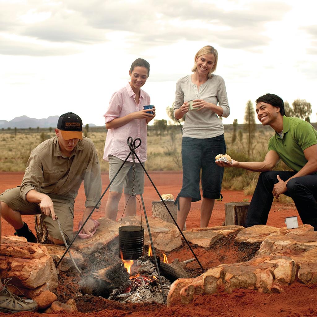 Cooking food on a guided bush walk at Ayers Rock