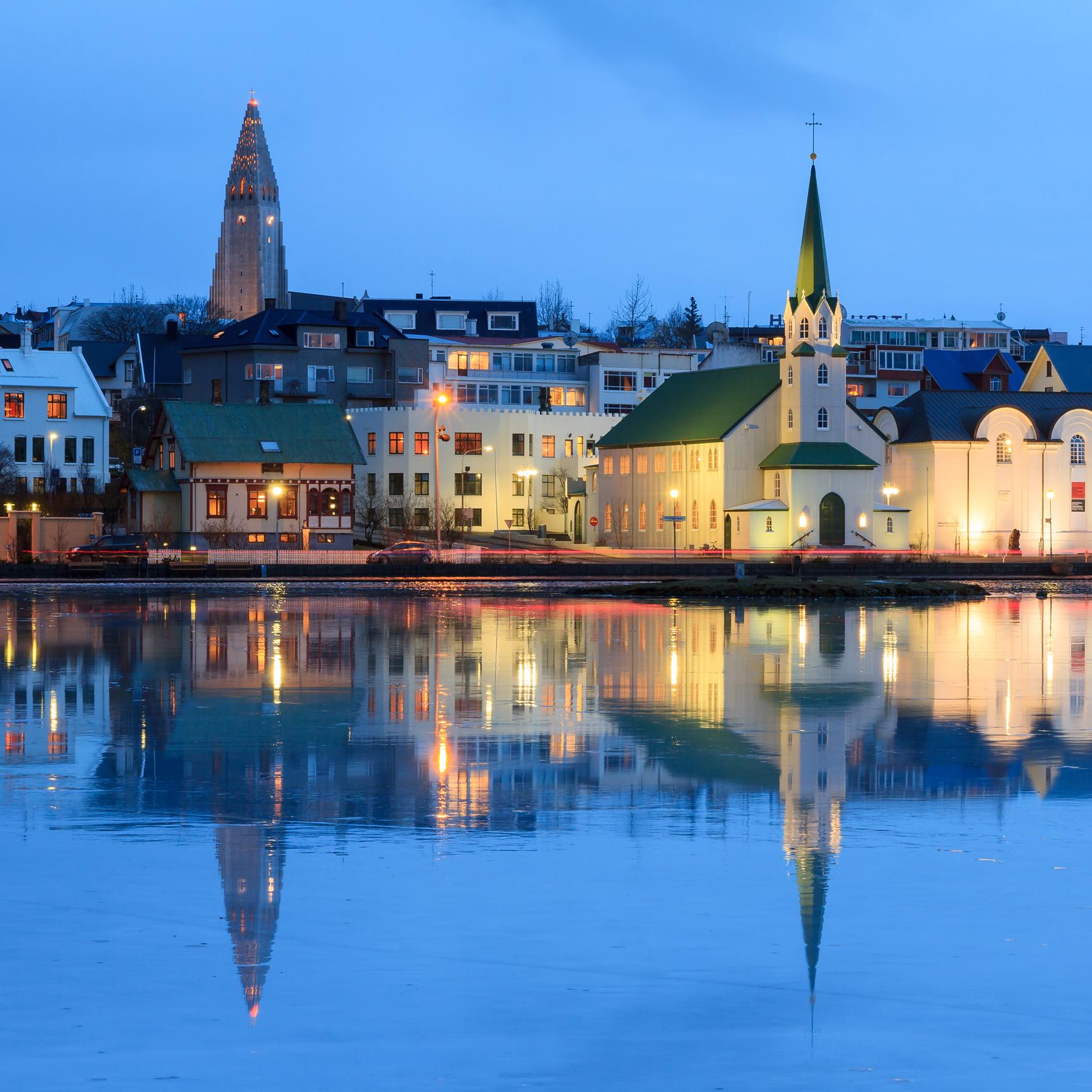 View Reykjavik at night with Iceland vacation packages