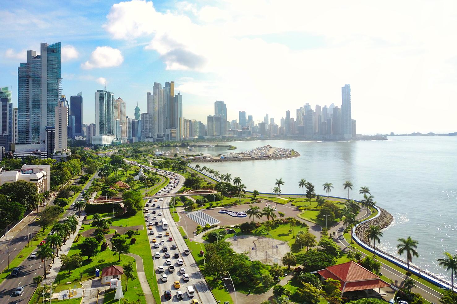 Sunlit views of Panama City’s skyline overlooking the water